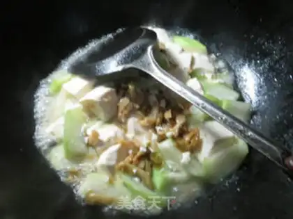 Make Squeeze the tofu and cook the flowers step 6