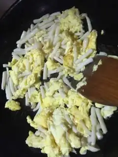 Make Seafood mushroom fried eggs step 5