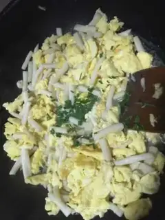 Make Seafood mushroom fried eggs step 8