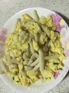 Make Seafood mushroom fried eggs step 9