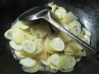 Make Squeeze the cabbage and make the potatoes step 8