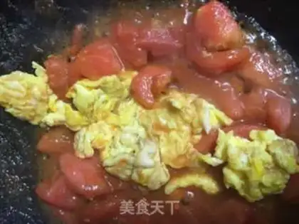 Make Tomato fried eggs step 9