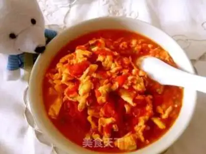 Make Tomato fried eggs step 16