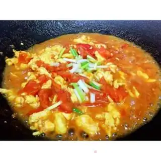 Make Tomato fried eggs step 9