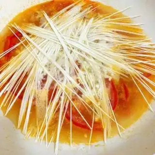 Make Tomato eggs hanging. Noodles step 3
