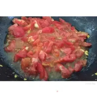 Make Tomato fried eggs step 9