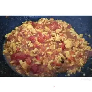 Make Tomato fried eggs step 10