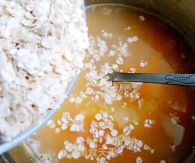 Make Rice oatmeal carrot congee step 4