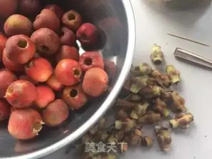 Make Snowballs of red nuts step 2