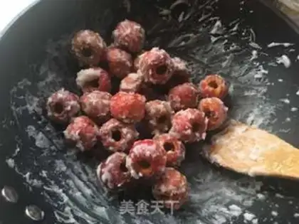 Make Snowballs of red nuts step 7