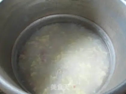 Make Eggs and salted rice congee step 6