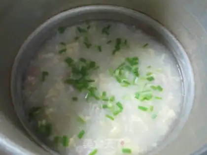 Make Eggs and salted rice congee step 7