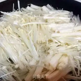 Make Cleaning up the golden needle mushrooms step 2