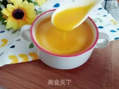 Make The baby feeds the pumpkin rice paste step 9