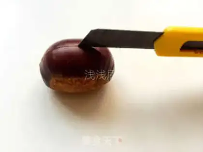 Make Sweet chestnuts roasting step 1