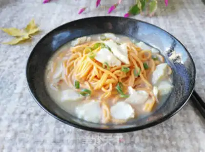 Make Black fish soup carrot noodles step 15
