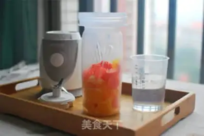 Make Fresh orange carrot juice step 2