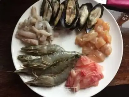 Make Spanish seafood step 1