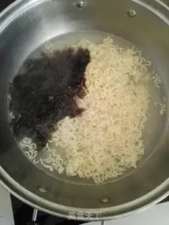 Make Red sausage egg noodles step 8