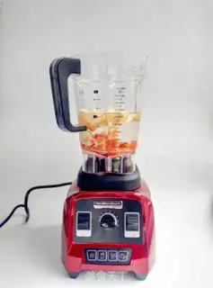 Make Apple orange carrot juice step 3