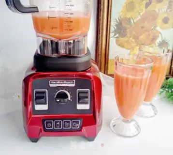 Make Apple orange carrot juice step 5
