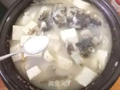 Make Mushroom tofu fish head soup step 11