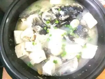 Make Mushroom tofu fish head soup step 12
