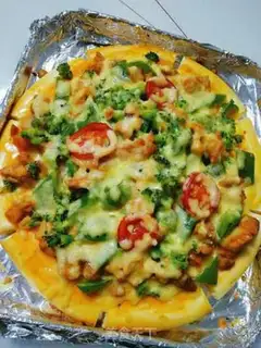 Make Chicken pizza in the field step 8