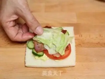 Make Egg bacon salad sandwich step 10