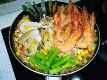 Make Spanish seafood step 17
