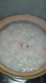 Make Wild catfish congee step 4