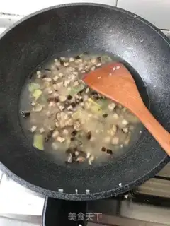 Make Porridge of mushroom abalone carrots step 12