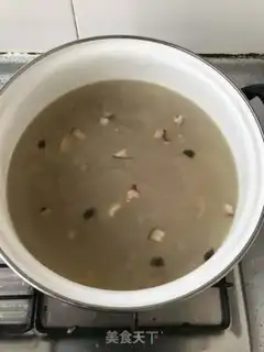 Make Porridge of mushroom abalone carrots step 13