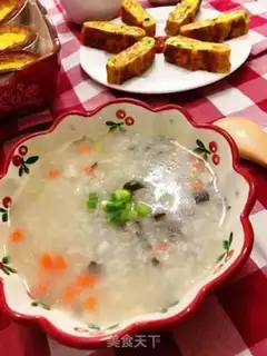 Make Porridge of mushroom abalone carrots step 14