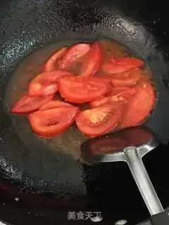 Make Tomato fried eggs step 7