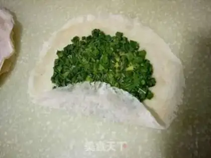 Make An egg roll with a pickle step 2