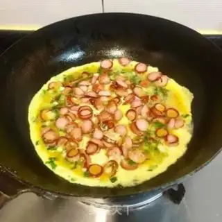Make Sausage fried eggs step 4