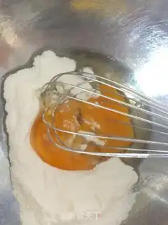 Make A multi-coloured cyclone cake step 9