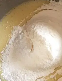 Make A multi-coloured cyclone cake step 12