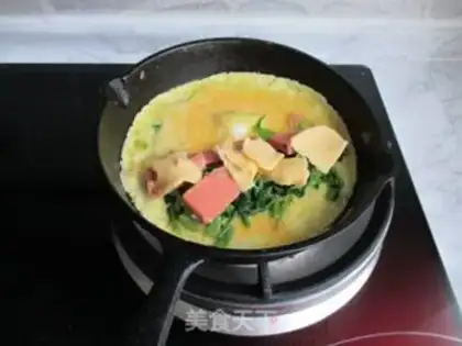 Make Spinach cheese fried eggs step 5