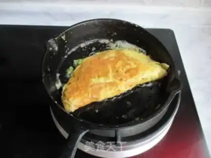 Make Spinach cheese fried eggs step 7
