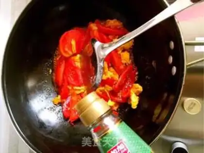 Make Tomato fried eggs step 10