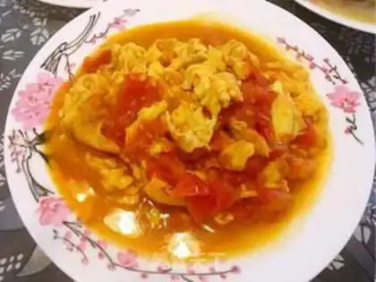 Make Tomato fried eggs step 10