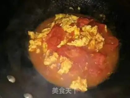 Make Tomato fried eggs step 8