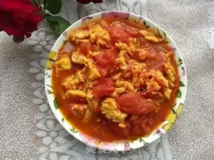 Make Tomato fried eggs step 10