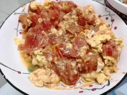 Make Tomato fried eggs step 5