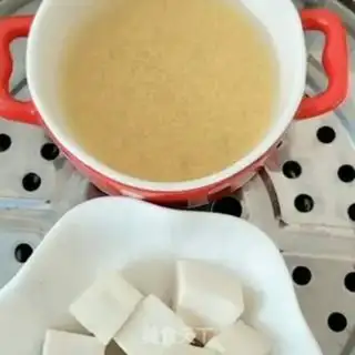 Make Porridge of cucumbers and tofu step 1
