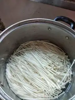 Make Frozen needle mushrooms step 2