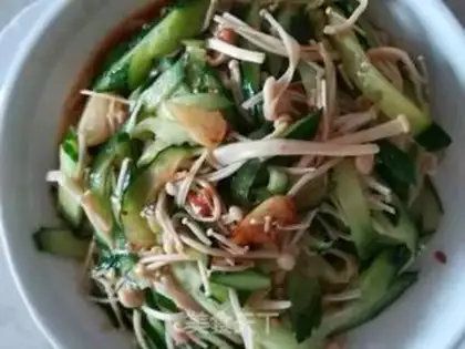 Make cucumber fried golden mushrooms step 6