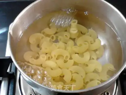 Make A macaroni with peanuts step 2